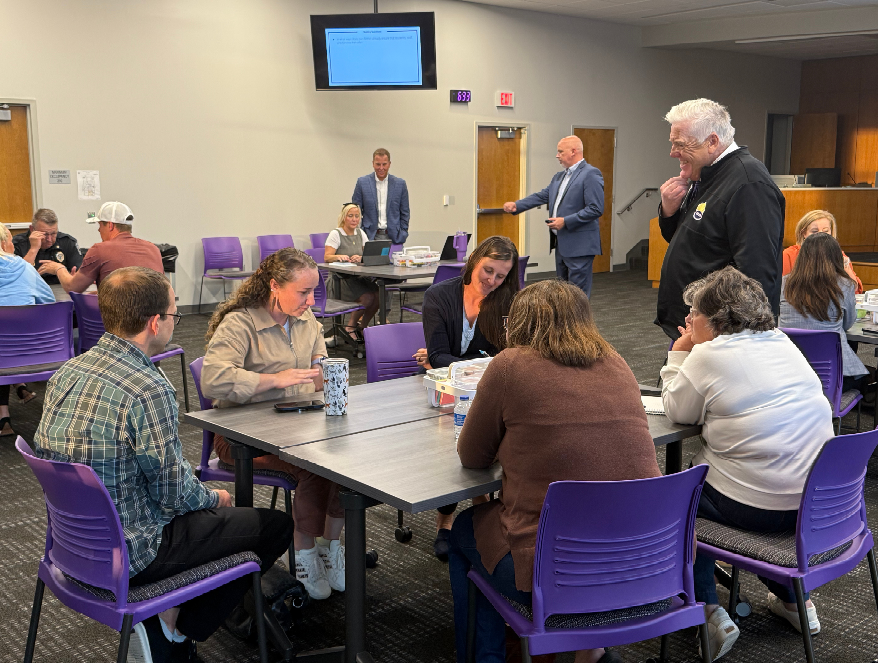 Small group conversations during the School Safety event on 10/7